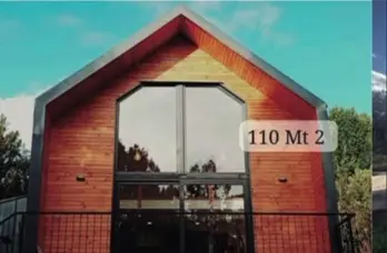 Fachada real de la Barn House de 110 m²